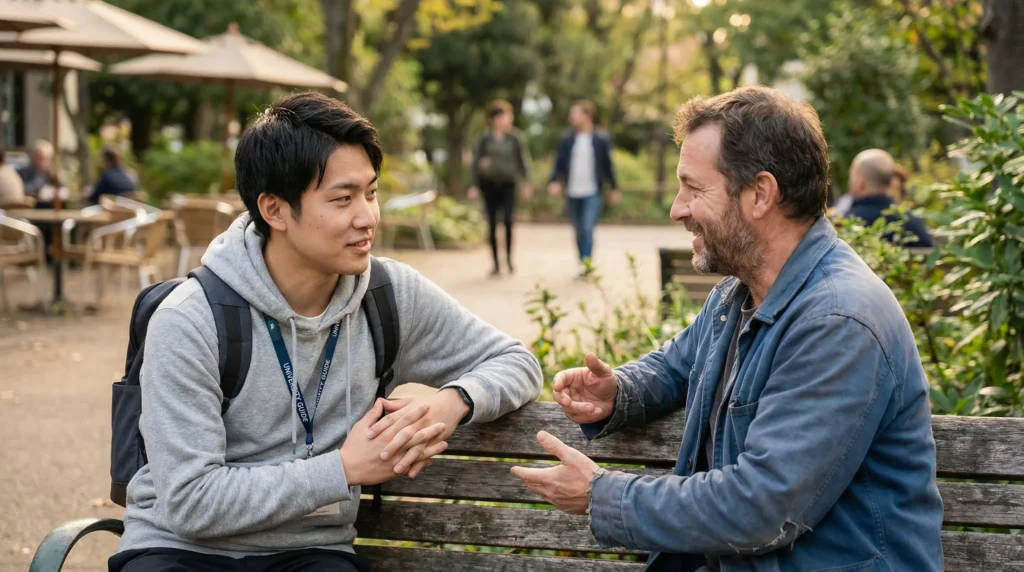 大学生のガイドヘルパーバイトで培われるコミュニケーション能力と観察力、利用者様と会話する大学生スタッフの風景